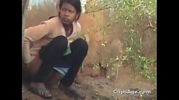 Indian girl filmed pissing outside