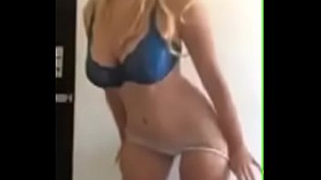 blonde with huge tits undressing 2