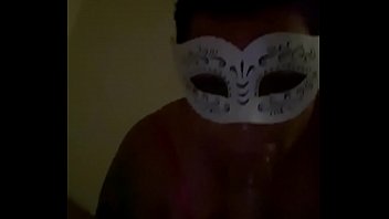 Milf blows fiancé while wearing a mask