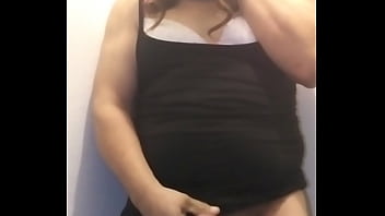 With a very sexy little black dress and lots of milk