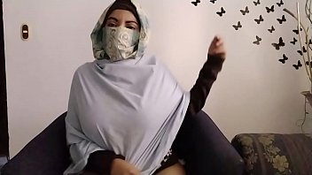 Praying Arab in hijab squirting her pussy on webcam