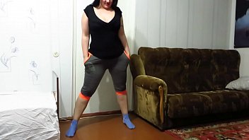 A mature BBW strips and fucks with a dildo on the floor, on a chair, and on a table. Milf shakes big natural tits and masturbates her shaved cunt. Amateur.