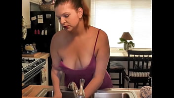 Big busty Riley's Down Blouse kitchen work flashing her boobs.