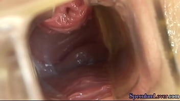 Speculum beauty toying wet cunt before spreading lips