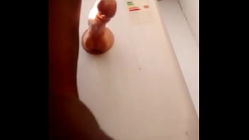 Big dildo in the vagina in front of the house