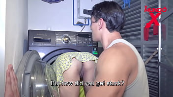 She is stuck in the washing machine and the friend fucks her hard in doggy style