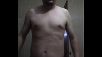 shirtless man showing off