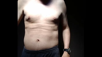 shirtless man showing off