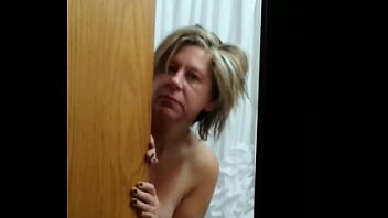 Mature wife getting ready for work in the morning