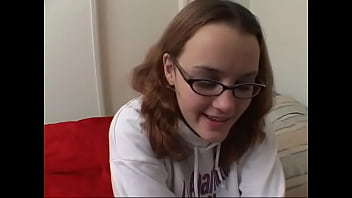Young brunette with glasses sucks cock hard then rides it and gets jizzed