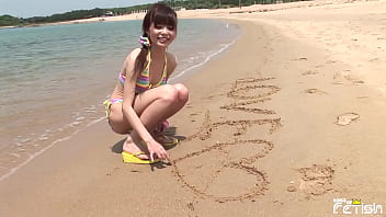 Young Japanese girl with small tits have a photo session outdoor by the sea
