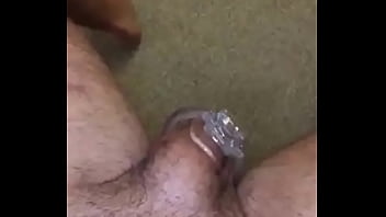 In a cage watching his wife get fucked