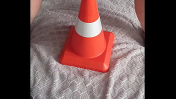 Development of the ass with a traffic cone