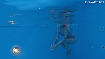 Blonde pornstar Mimi enjoys nude action underwater