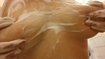Girl in shower big natural boobs in foam