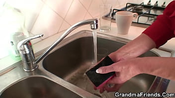 Horny granny fucked by two service guys