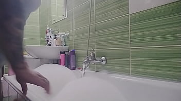 Hot pregnant teen wet clothes in the bath