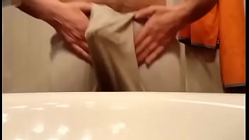 Handjob and cumshot in front of the mirror