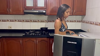 stepsister making food with a vibrator in her ass.