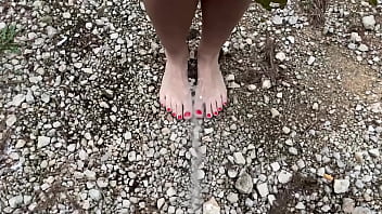 Pissing on MILF babe Feet on the Beach