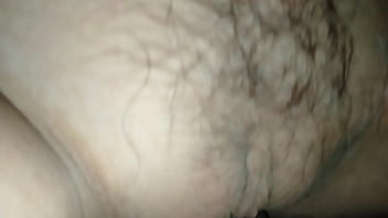 Spreading the pussy of a pretty girl, fucking her clit until the cum fills her pussy hole.
