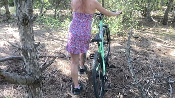 Pretty girl riding bicycle and masturbating her hairy pussy till someone find her in the forest and fuck her in doddy position