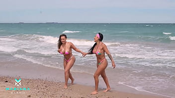 Colombians get horny on a nudist beach in Europe - Lesbian sex with Latin porn stars