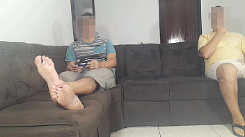 Blonde being fucked in front of her colleague who is playing video games