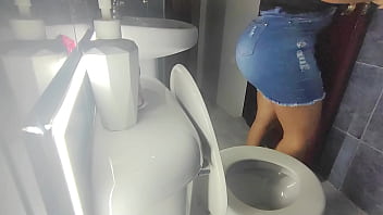 Stepsister caught in public bathroom with skirt and transparency