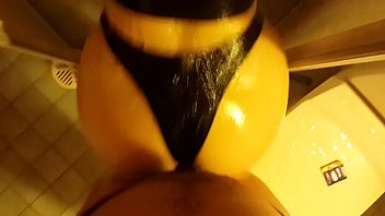 Me fucking my wife's big wet ass in latex strings in shower